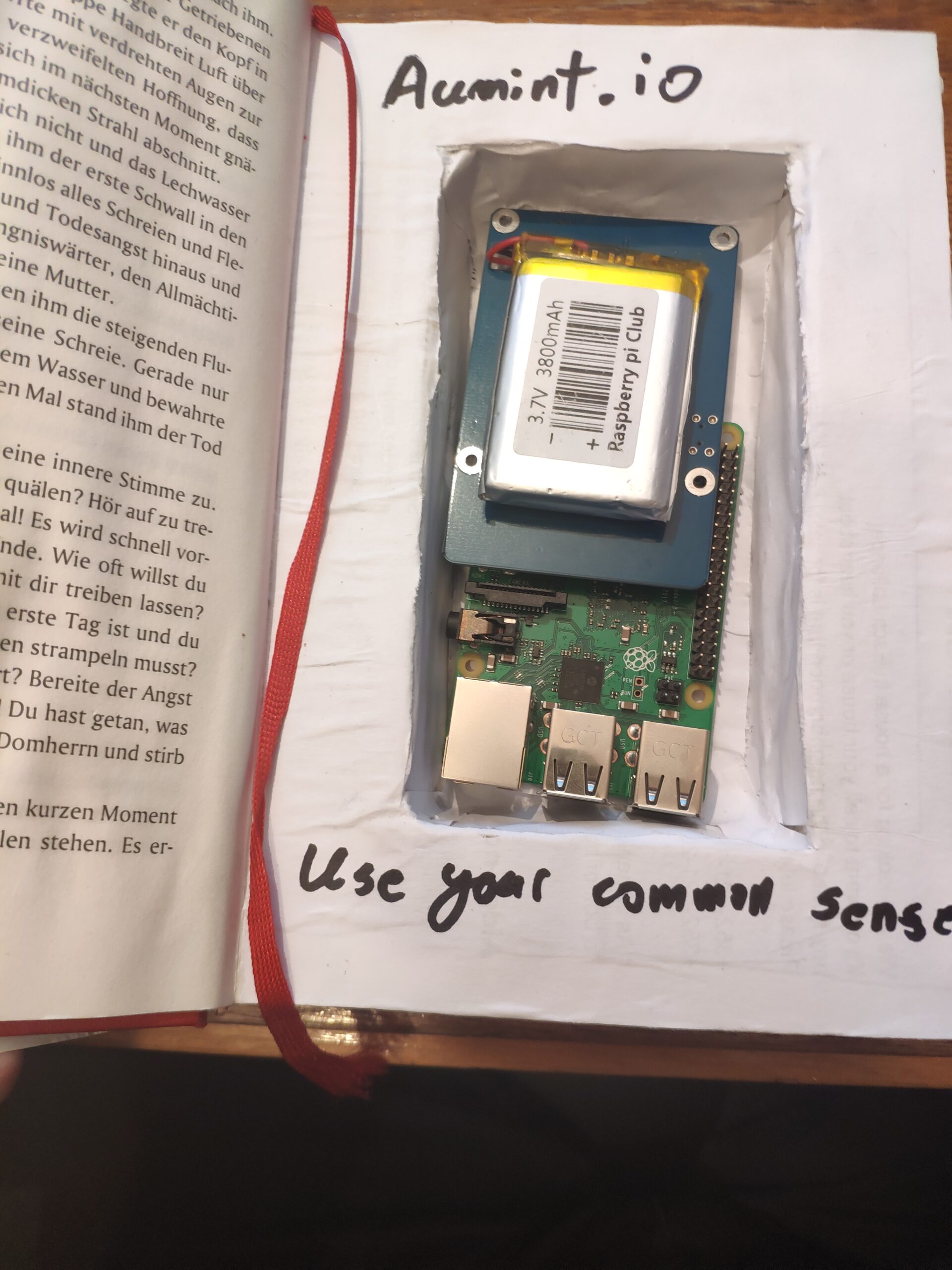 Raspberry pi and power source hidden in book
